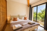 Bedroom overlooking the vineyard estate - Villa Terra Vigna in Southern Corsica