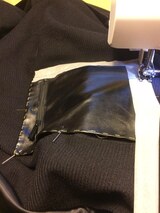 Complete refurbishment of the Skaï parts, the collar and the zipped piped pockets