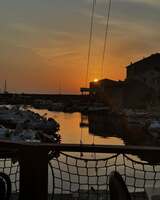 Sonnenuntergang über dem Hafen von Centuri - Restaurant Chez Marc am Cap Corse