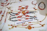 Luciaauge- und Korallenarmbänder - Korsika