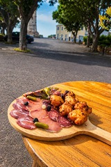 Corsican charcuterie platter and cheese fritters - Au Bon Clocher Restaurant in Canari