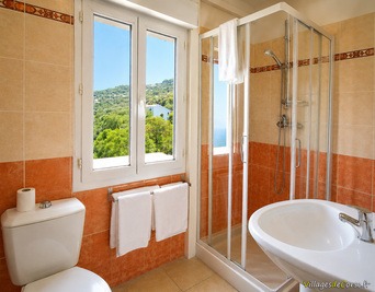 Private bathroom of room 2 - Au Bon Clocher Hotel in Canari