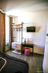 TV a parete - attrezzatura camera hotel a Vivario