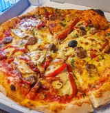Pizza cotta a legna