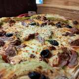 Pizza mit korsischem Kalbs-Stufatu - A Bastella, Lucciana
