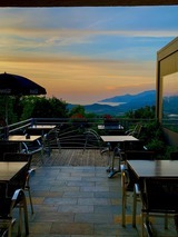 Restaurant terrace with a sea view - I Fratelli in Rapale, Corsica.