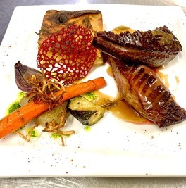 Duck breast with honey and rosemary, served with chives - Restaurant I Fratelli in Rapale.