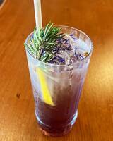 Purple cocktail - House creation at the bar of U Palmentu Restaurant in Centuri